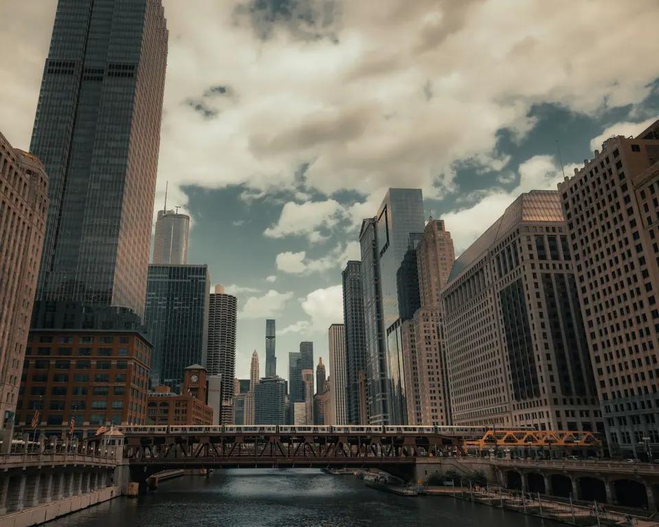 Chicago industrial district at dusk with the skyline behind. Demo photography.